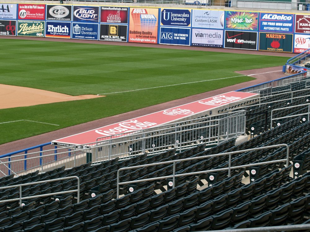 Lehigh Valley Ironpigs painted dugout top and outfield signage large format printing - Sign ...